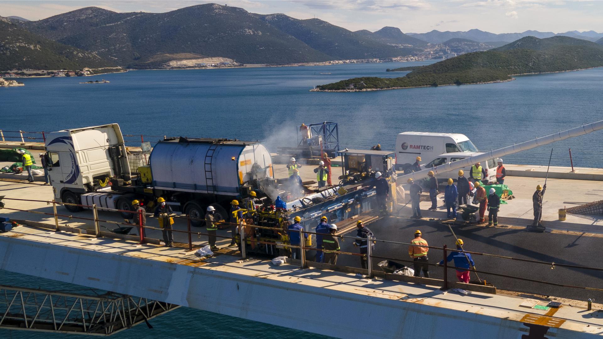 Pelješac Bridge gets first layer of asphalt