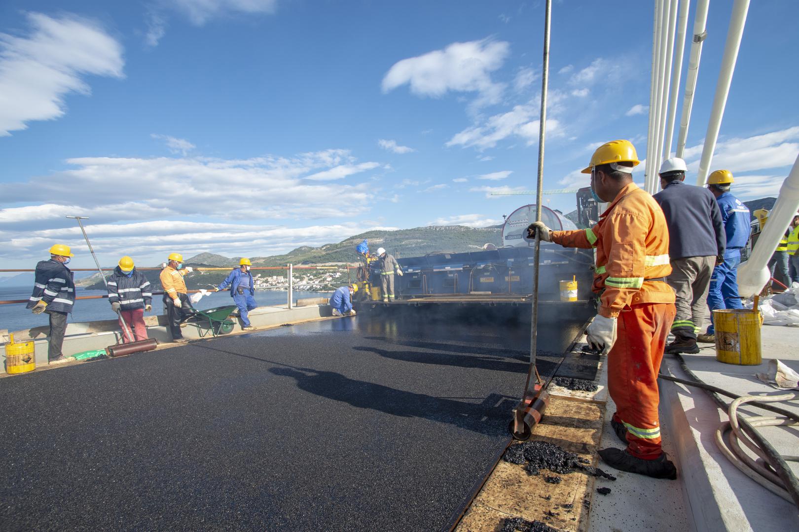 Pelješac Bridge gets first layer of asphalt