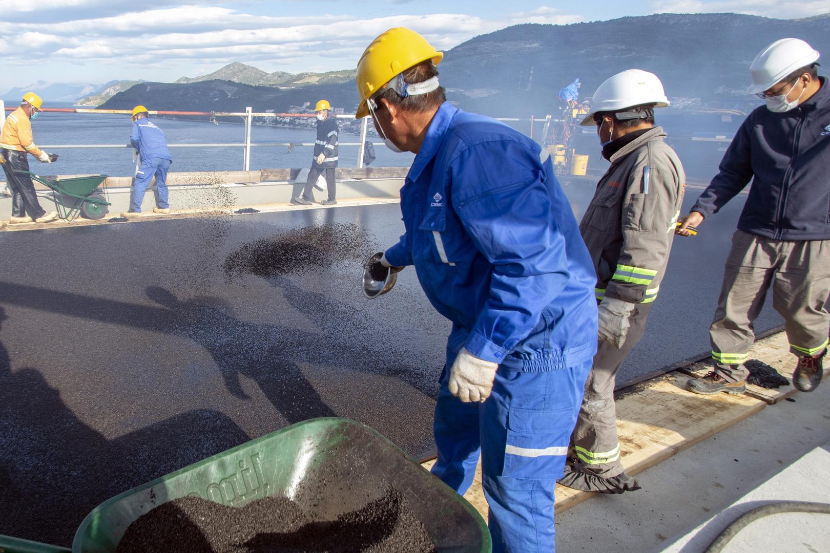 Pelješac Bridge gets first layer of asphalt