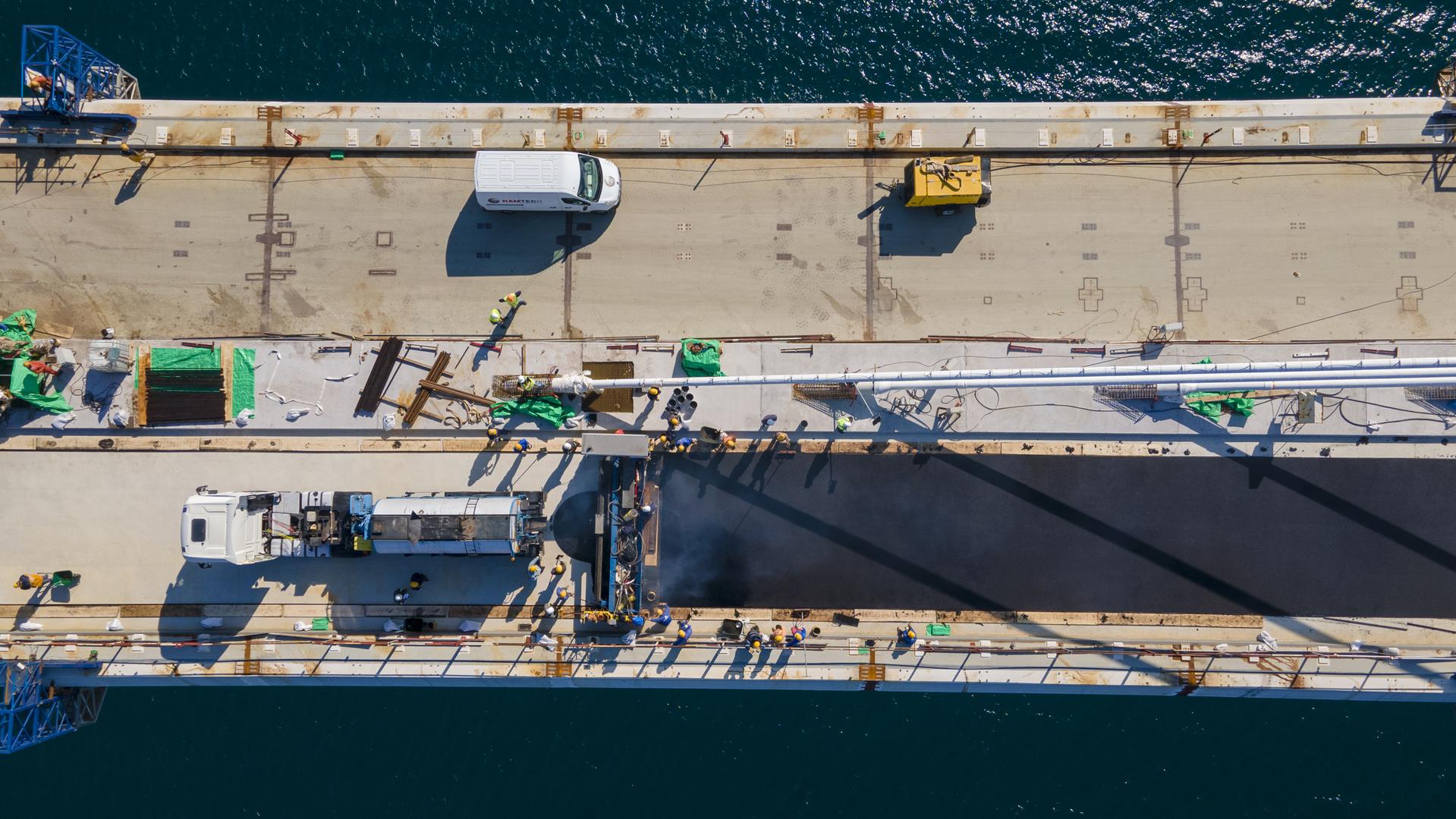 Pelješac Bridge gets first layer of asphalt