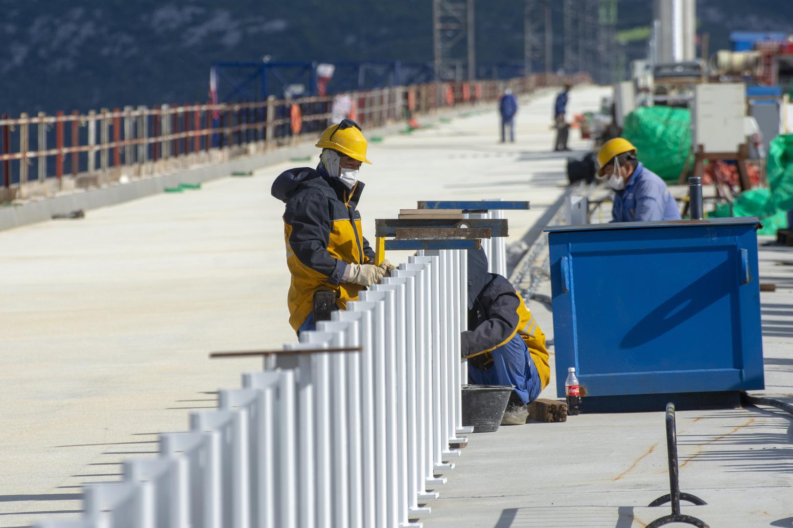 Pelješac Bridge gets first layer of asphalt