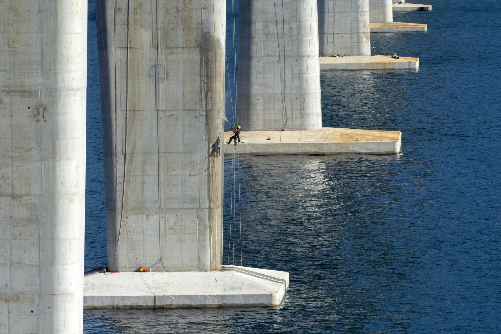 Pelješac Bridge gets first layer of asphalt